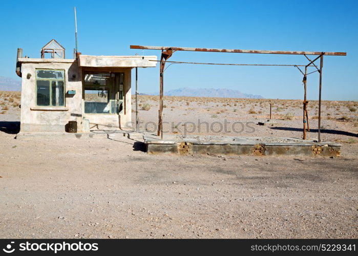 blur in iran old gas station the desert mountain background and nobody