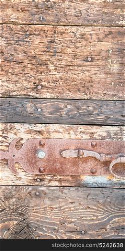 blur in italy antique door entrance and decorative handle for background