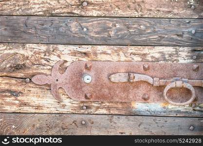 blur in italy antique door entrance and decorative handle for background