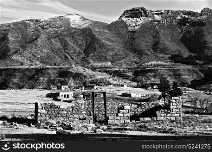 blur in lesotho malealea street village near mountain and coultivation field