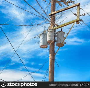 blur in philippines a electric pole with transformer and wire the cloudy sky