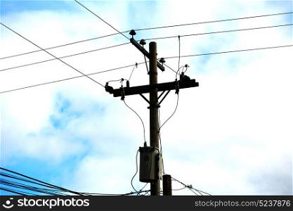 blur in philippines a electric pole with transformer and wire the cloudy sky