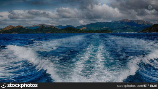 blur in philippines a view from boat and the pacific ocean mountain background