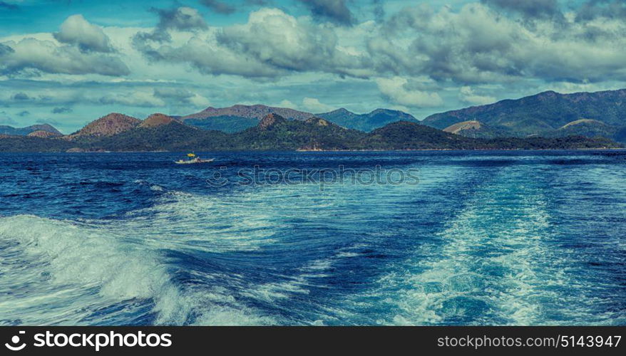 blur in philippines a view from boat and the pacific ocean mountain background