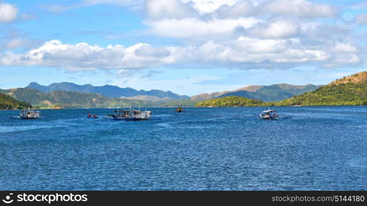 blur in philippines a view from boat and the pacific ocean mountain background