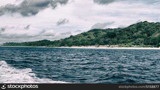 blur in philippines a view from boat and the pacific ocean mountain background