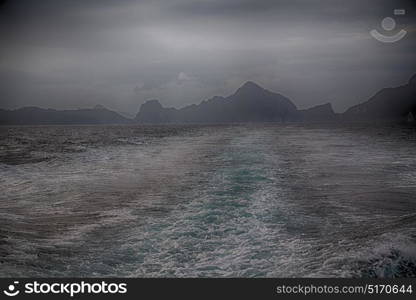 blur in philippines a view from boat and the pacific ocean mountain background