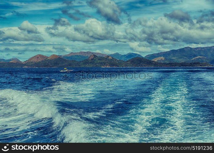 blur in philippines a view from boat and the pacific ocean mountain background