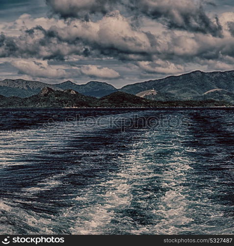 blur in philippines a view from boat and the pacific ocean mountain background