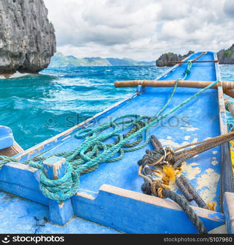 blur in philippines view of the island hill from the prow of a boat