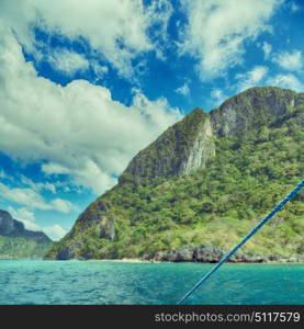 blur in philippines view of the island hill from the prow of a boat