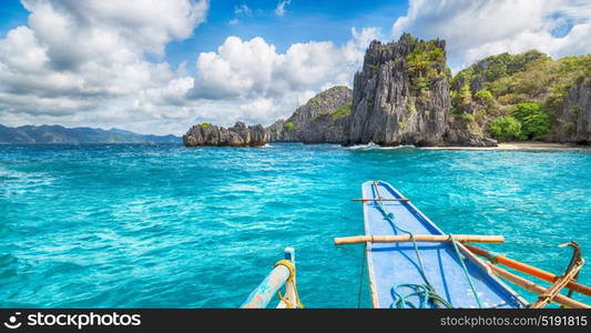 blur in philippines view of the island hill from the prow of a boat