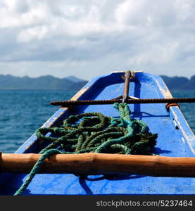 blur in philippines view of the island hill from the prow of a boat