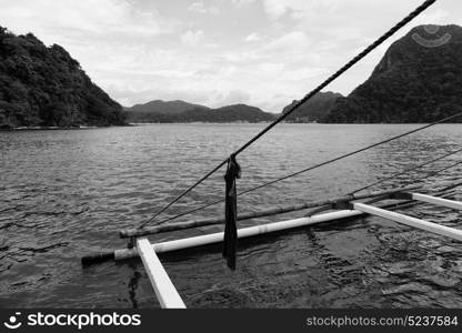 blur in philippines view of the island hill from the prow of a boat