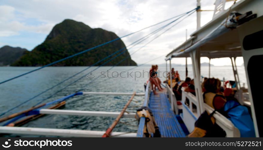 blur in philippines view of the island hill from the prow of a boat