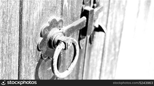 blur in south africa antique door entrance and decorative handle for background