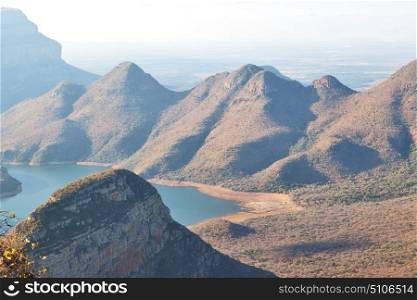 blur in south africa blyde river canyon plant rock and pond water