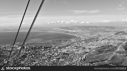 blur in south africa cape town city skyline from table mountain sky ocean and house