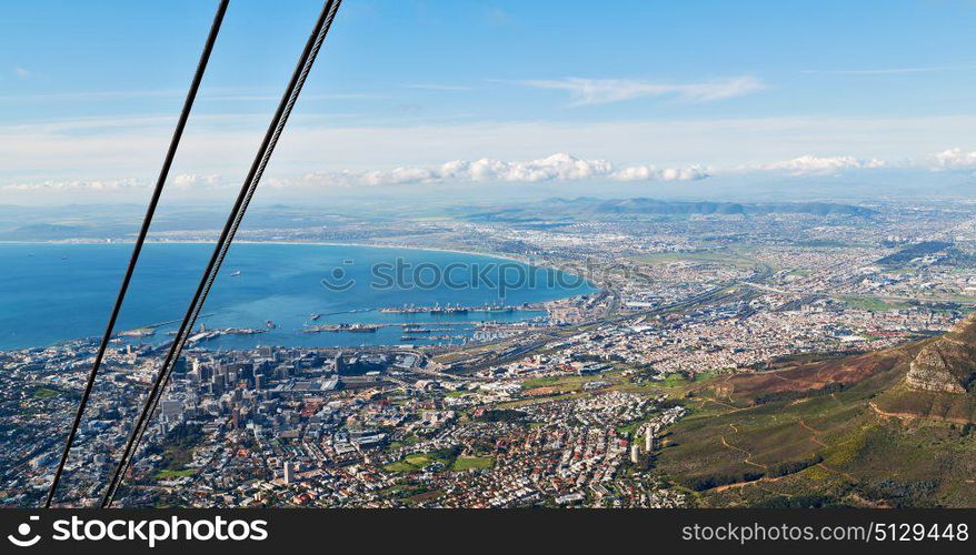 blur in south africa cape town city skyline from table mountain sky ocean and house