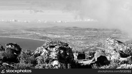 blur in south africa cape town city skyline from table mountain sky ocean and house