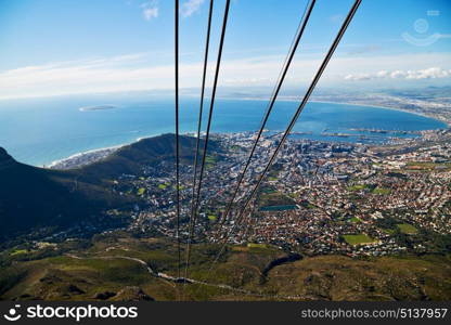 blur in south africa cape town city skyline from table mountain sky ocean and house