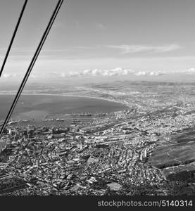 blur in south africa cape town city skyline from table mountain sky ocean and house