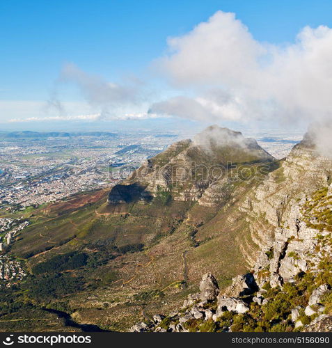 blur in south africa cape town city skyline from table mountain sky ocean and house