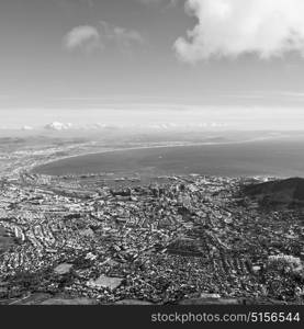 blur in south africa cape town city skyline from table mountain sky ocean and house