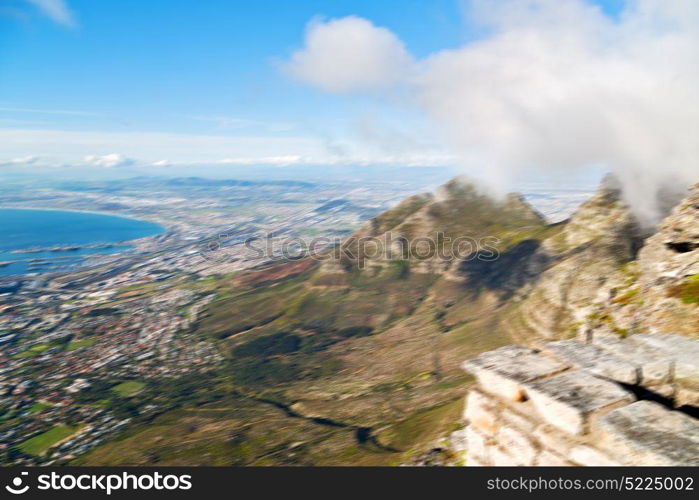 blur in south africa cape town city skyline from table mountain sky ocean and house