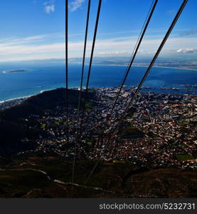 blur in south africa cape town city skyline from table mountain sky ocean and house