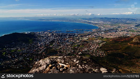 blur in south africa cape town city skyline from table mountain sky ocean and house