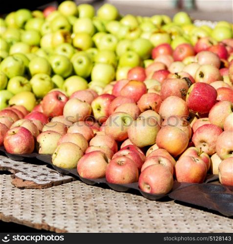 blur in south africa market red and yellow apples in the natural light