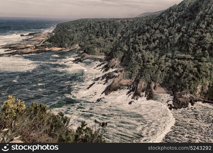 blur in south africa sky ocean tsitsikamma reserve nature and rocks