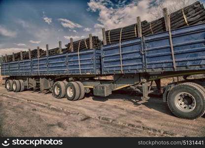 blur in south africa truck full of forest wood dirt and dust