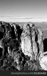 blur in south africa valley of desolation dirty road rock tree and sky