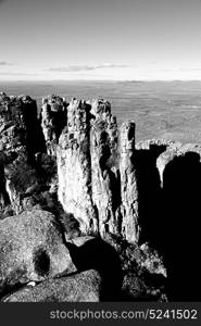 blur in south africa valley of desolation dirty road rock tree and sky