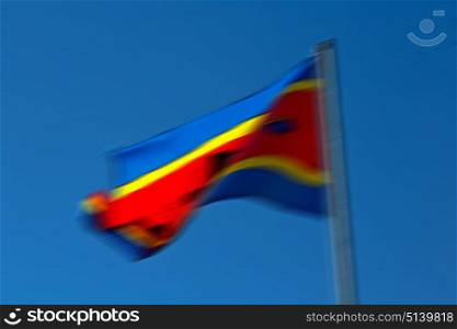 blur in swaziland waving flag and sky like abstracr concept