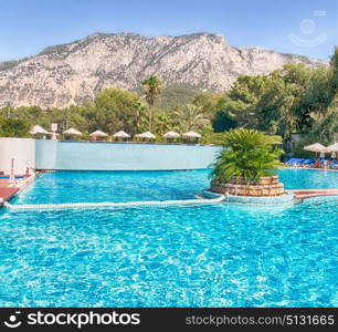 blur in turkey resort pool luxury vacation and background mountain