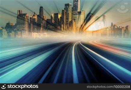 Blur Motion moving from japan train monorail heading to New York Cityscape with sunset ray background, United States, Automotive and elevated road, innovation and inspiration concept