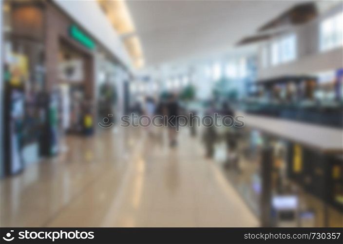 Blur people walking shopping mall for background usage.