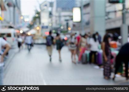Blur people walking the streets