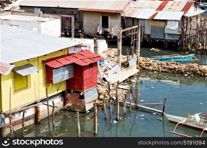 blur philippines house in the slum for poor people concept of poverty and degradations