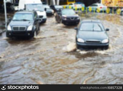 Blured view of car traffic problem in a heavy rain