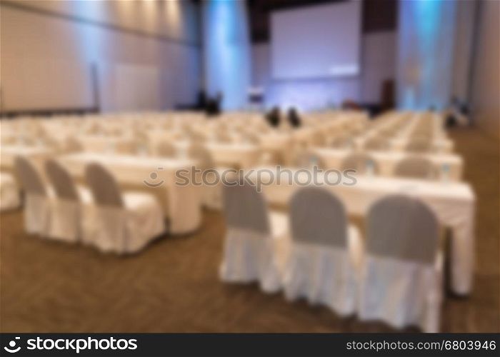 blurred abstract background of conference seminar meeting at the convention hall