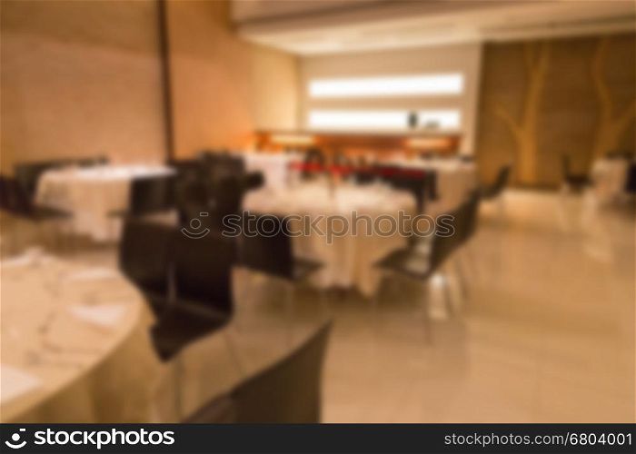 blurred abstract background of table and chair in restaurant