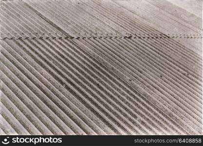 blurred abstract background texture of a corrugated metal roof