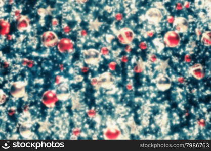 Blurred abstract Christmas and New Year background with bright decoration on pine tree