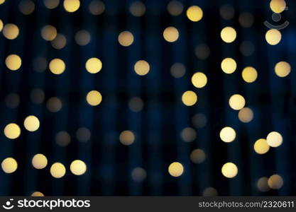 Blurred abstract hanging decorative lights with bokeh in night background