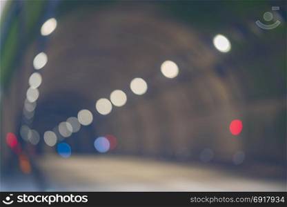 Blurred Abstract of Tunnel Road with two lane highway