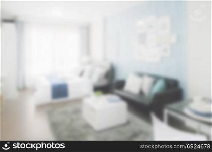 Blurred background bedroom with sofa in blue color scheme decoration